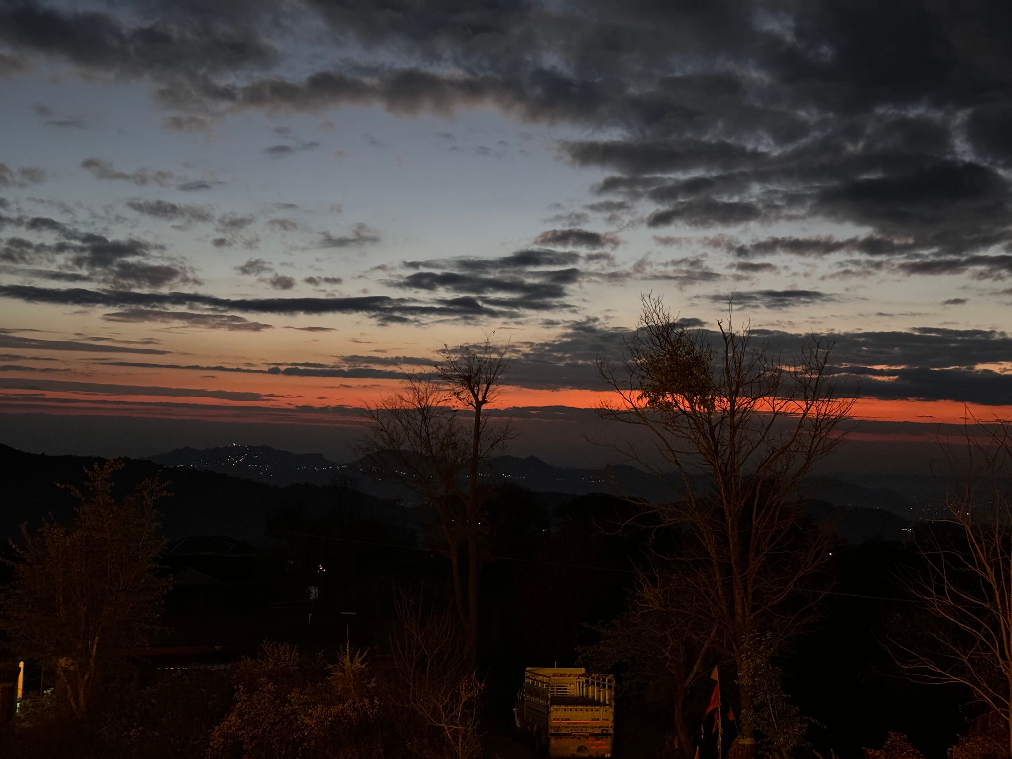 Orange sunset sky over mountains